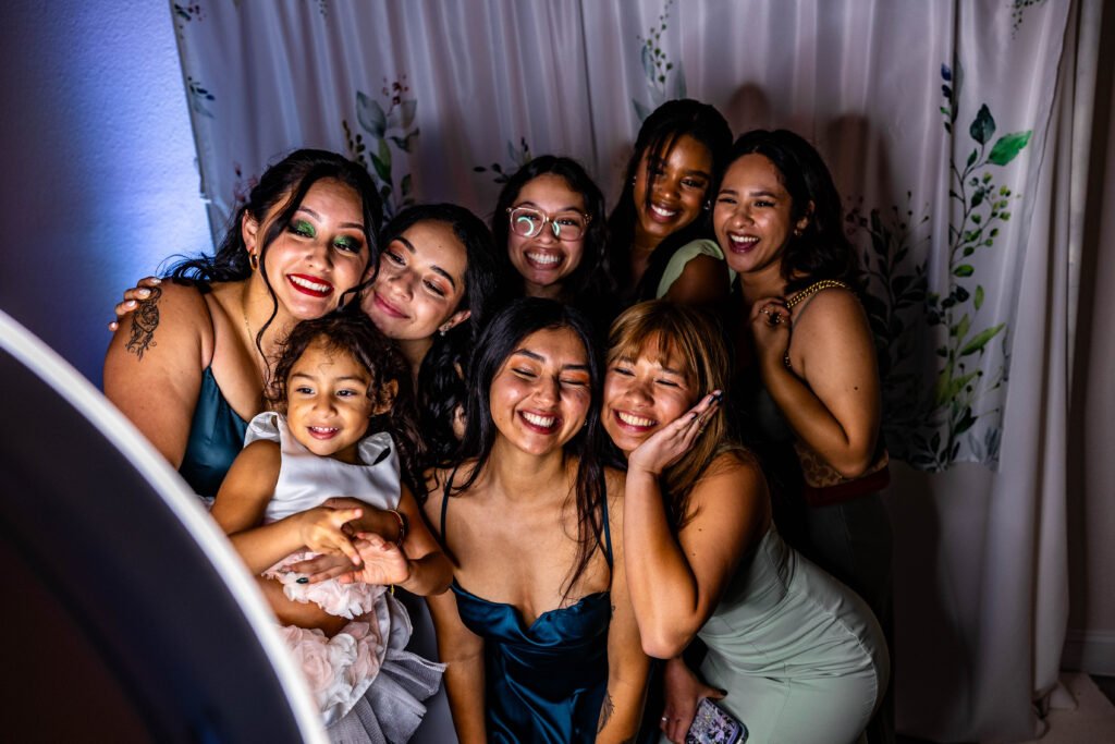 Guests smiling together at a birthday celebration