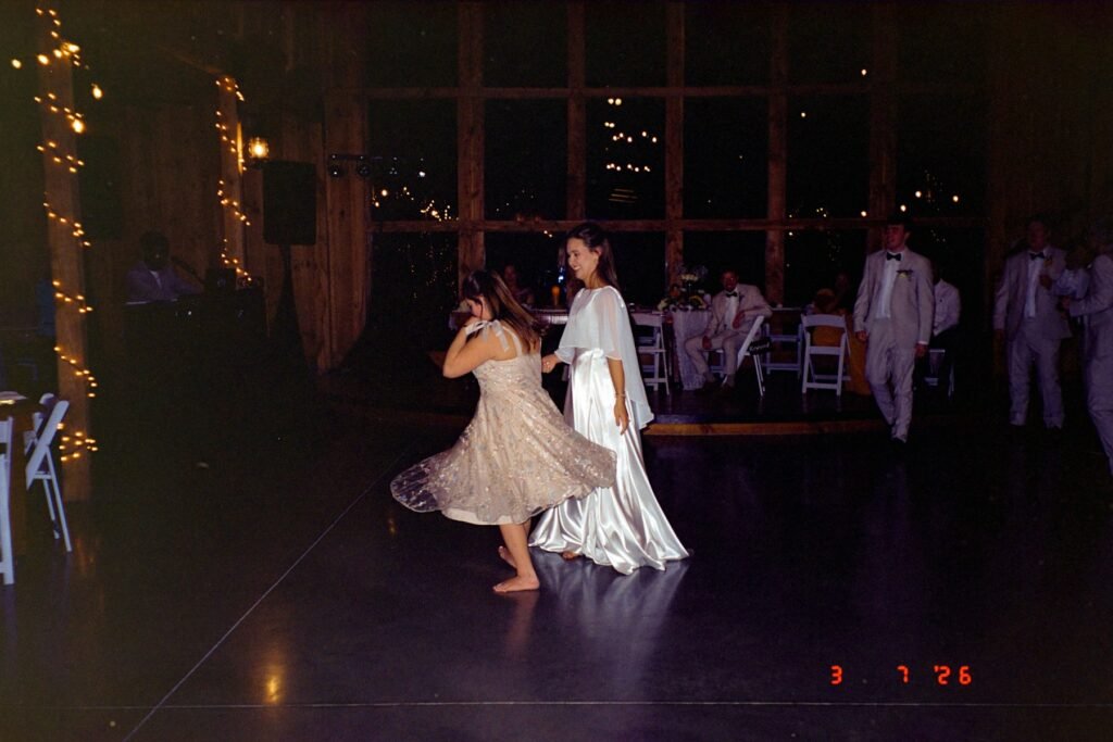 Guests dancing at a wedding reception